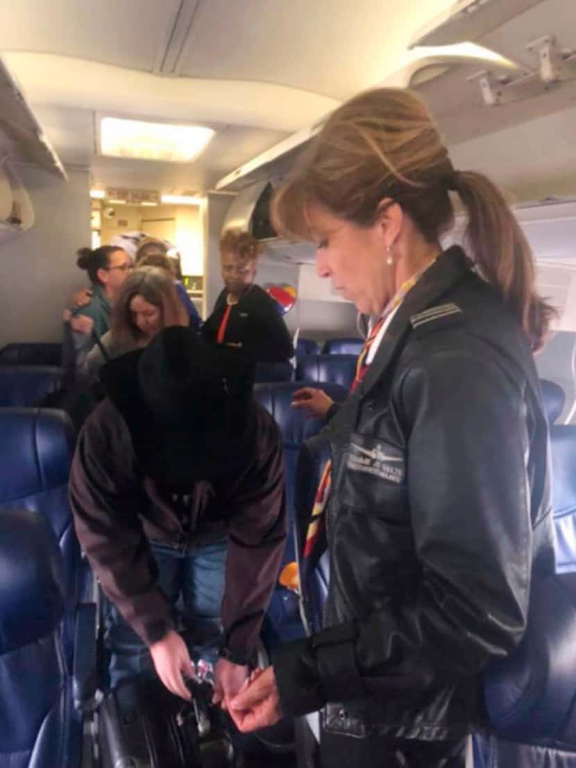 This photo provided by Diana McBride Self shows Flight 1380 pilot Tammie Jo Shults, right,...