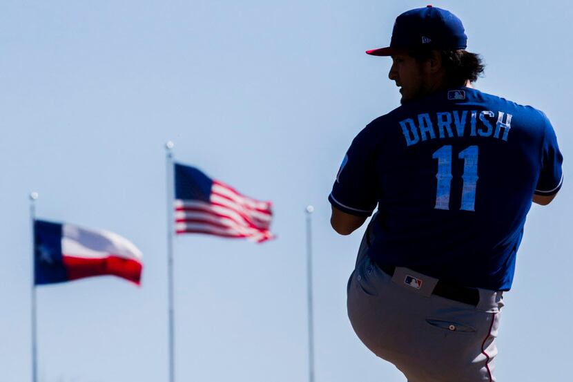 Texas Rangers starting pitcher Yu Darvish (11) pitches a simulated game during a workout at...