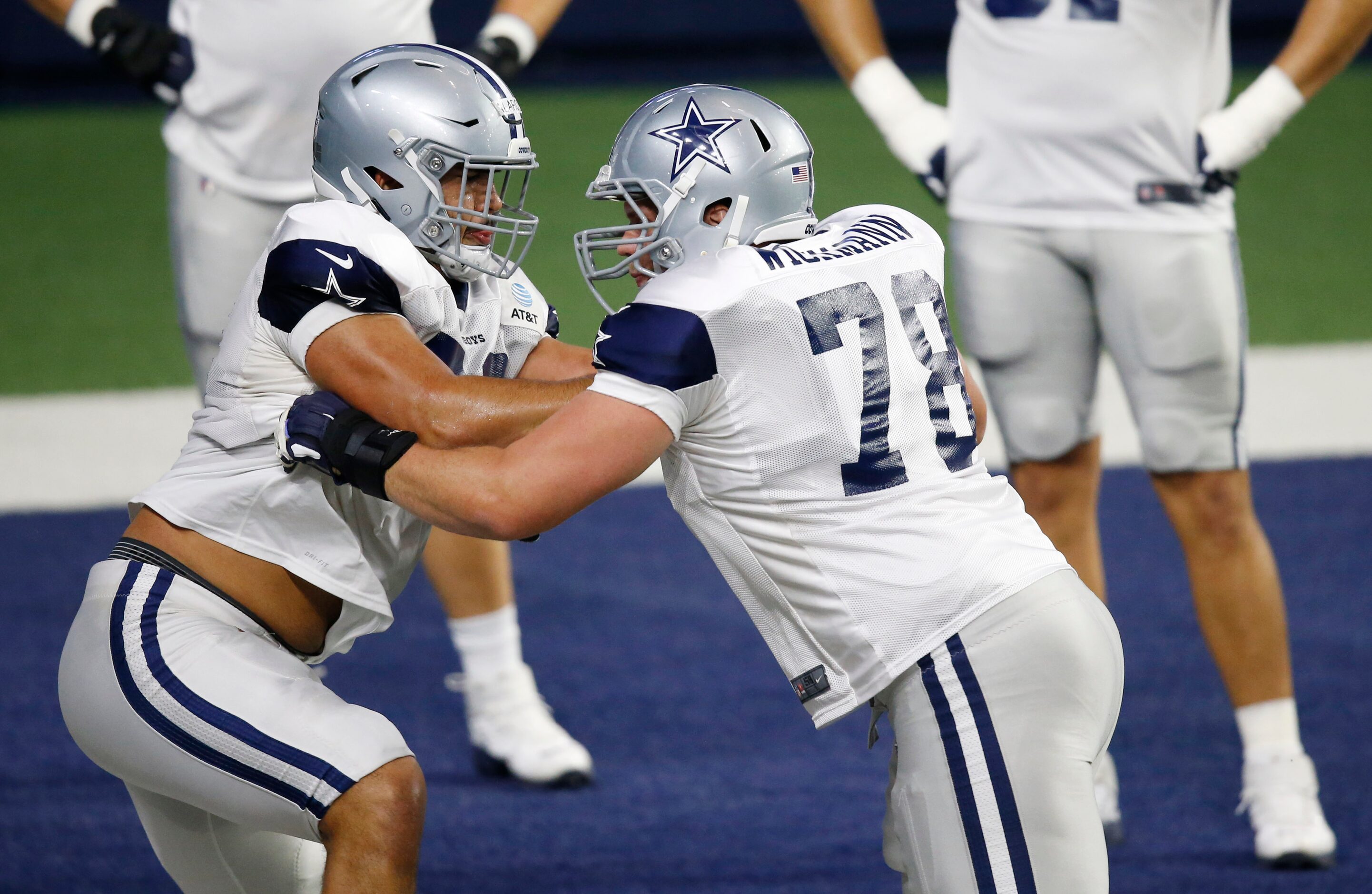 Dallas Cowboys offensive lineman Isaac Alarcón (60) blocks Dallas Cowboys guard Cody...