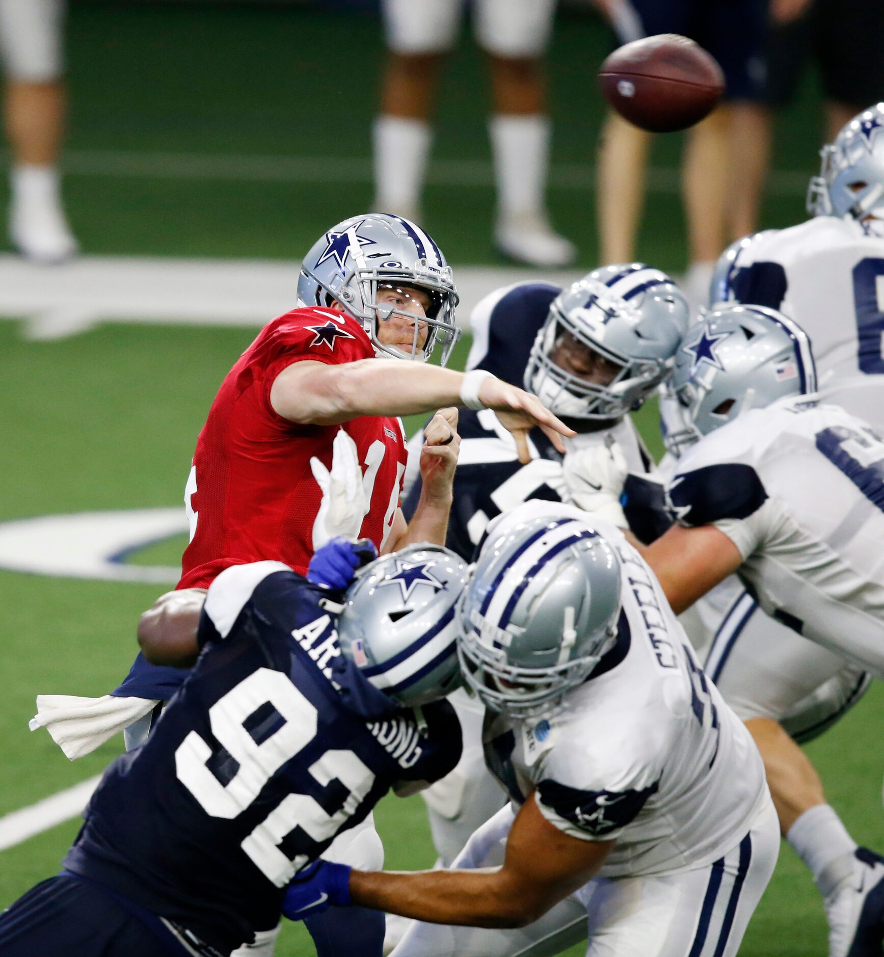 Dallas Cowboys quarterback Andy Dalton (14) attempts a pass during training camp inside the...