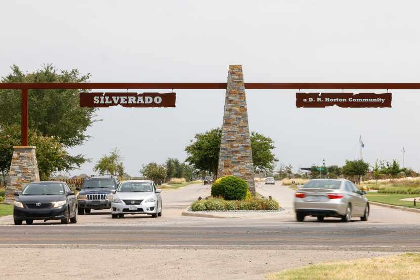 Vehicles pass through the front entrance of Silverado, one of the top-selling master-planned...