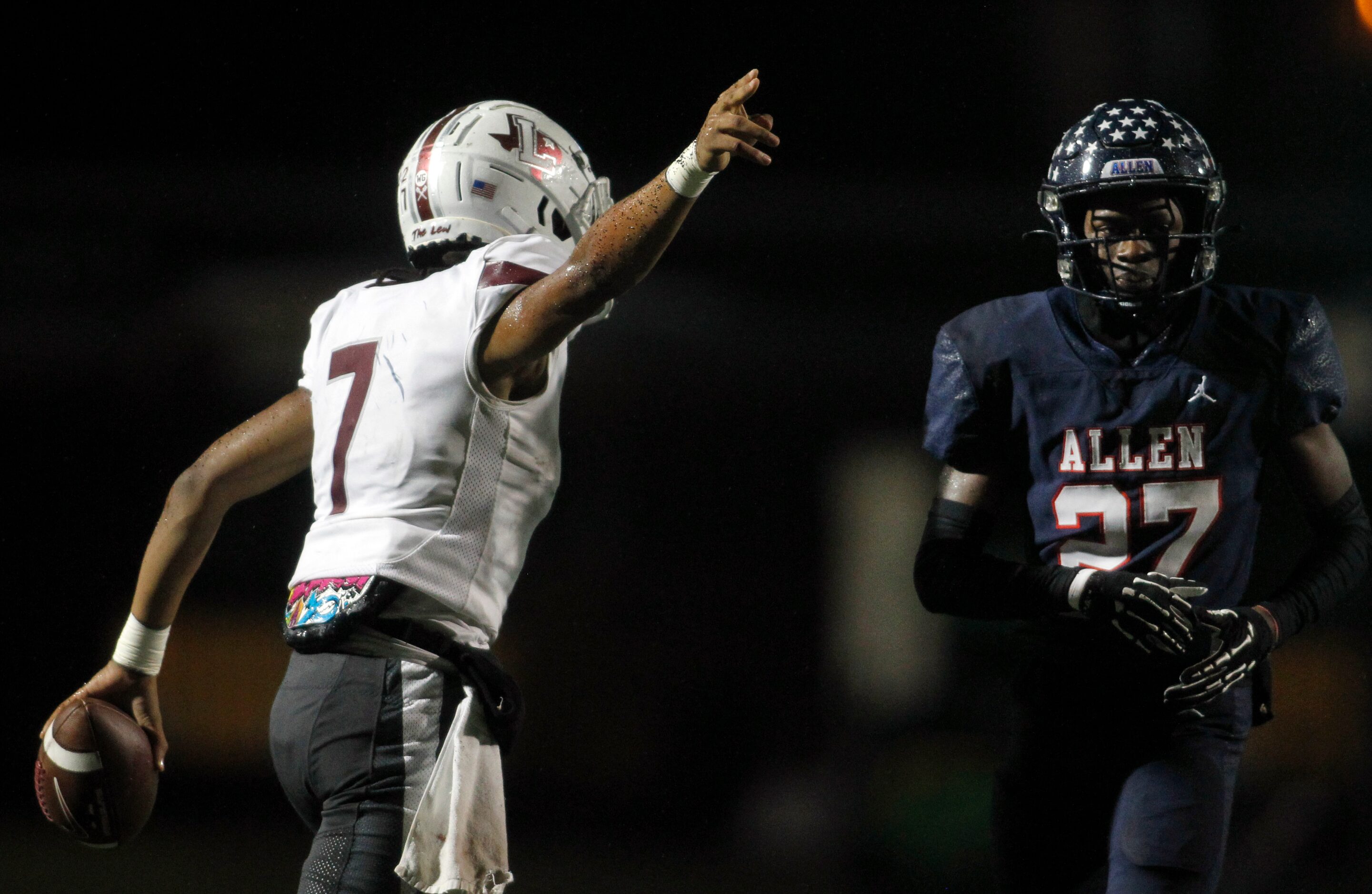 Lewisville quarterback Ethan Terrell (7), signals for a first down after a long ground...