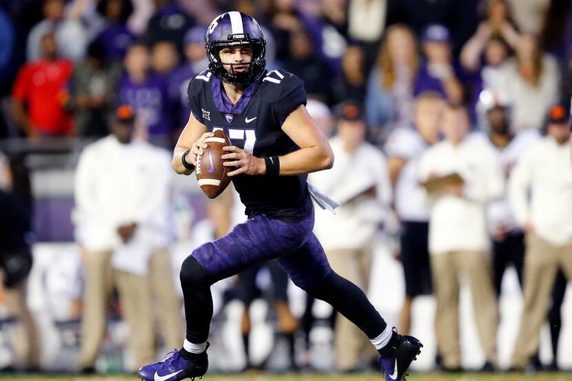 TCU Horned Frogs quarterback Grayson Muehlstein (17) rolls out looking for a receiver during...