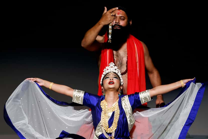 Lead cast member Arnila Nolok, (front), as Menaka, and  Kausik Roy as Bishwamitra, act...