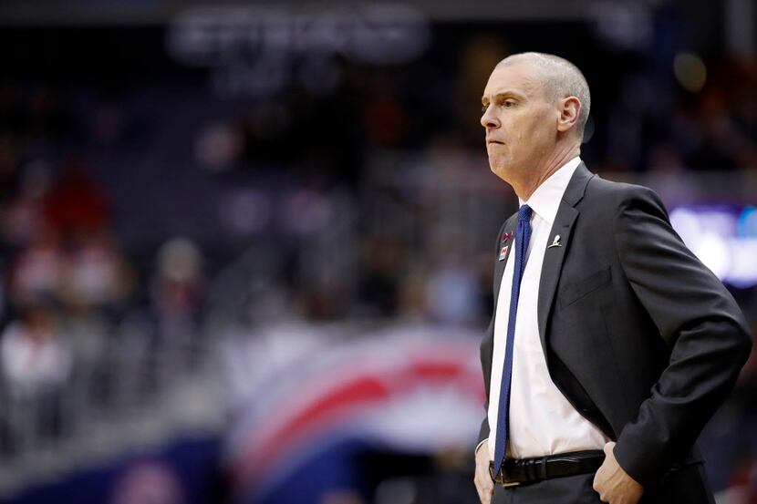 Dallas Mavericks head coach Rick Carlisle watches his team during the first half of an NBA...