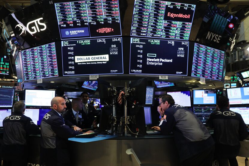 Traders work on the floor of the New York Stock Exchange on June 10.