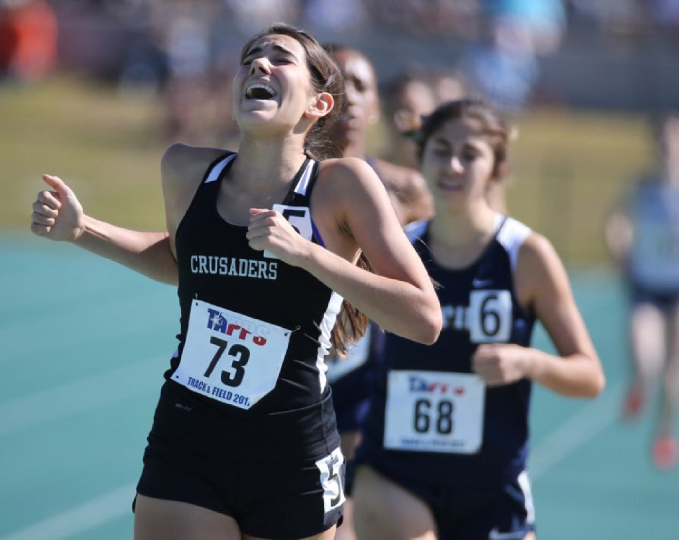 St Michaels Kinga Parrish wins the 5A womens 800 meter run at the TAPPS State track meet at...