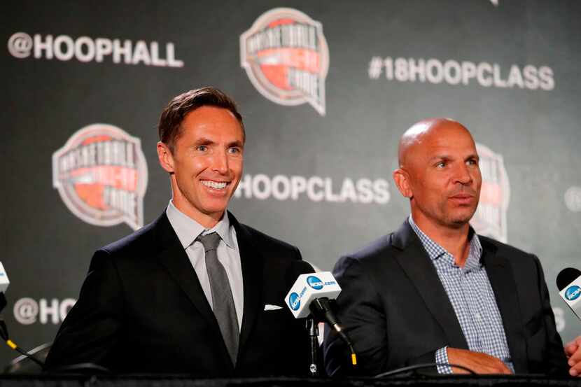 Former NBA player Steve Nash, left, smiles as former NBA player Jason Kidd, right, looks on...