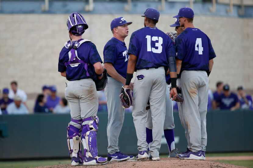 TCU head coach Jim Schlossnagle approaches the mound in the eighth inning of the NCAA Fort...