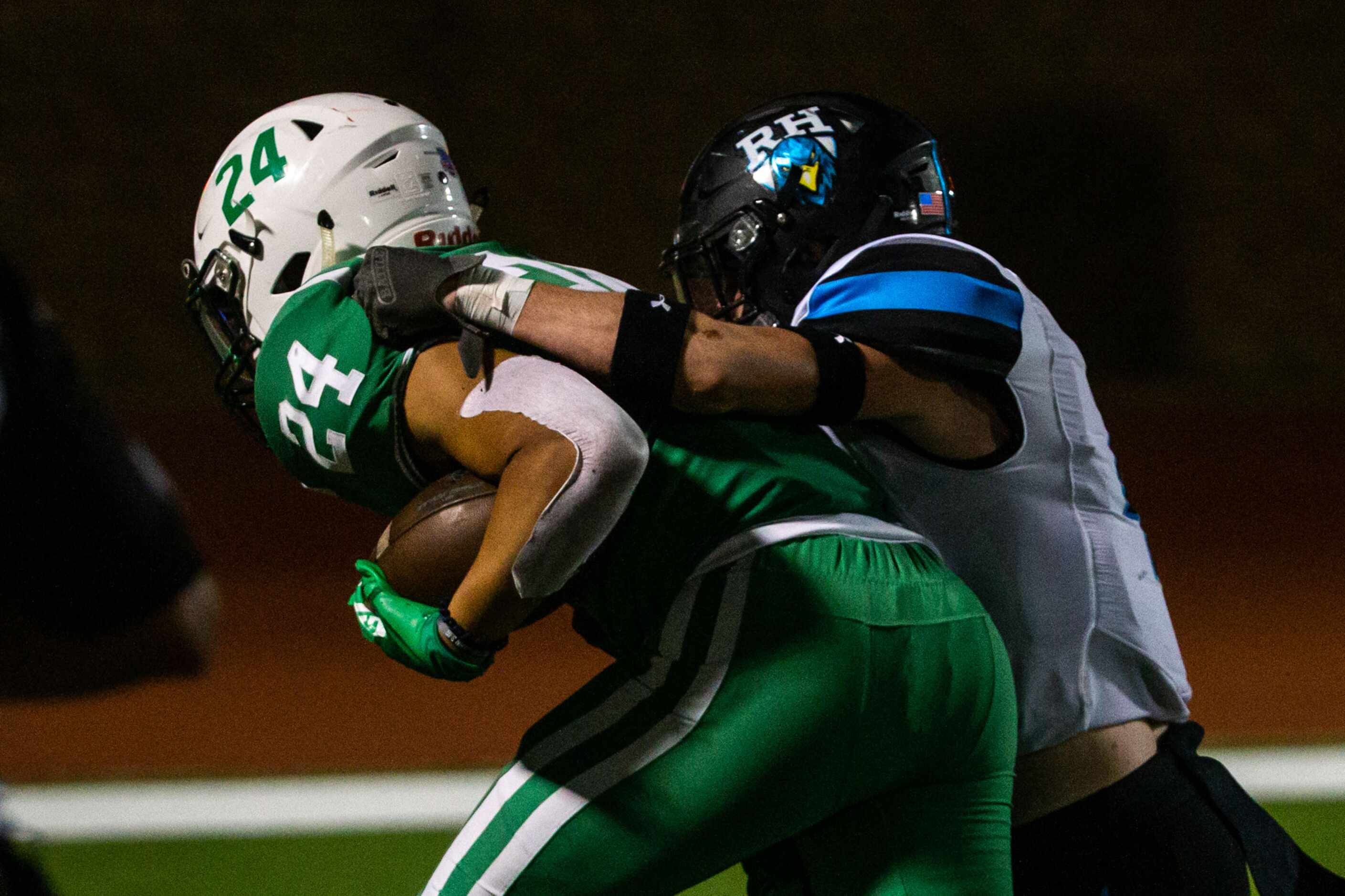 Rock Hill defensive back Coleman Weaver (4) fails to bring down Lake Dallas running back...