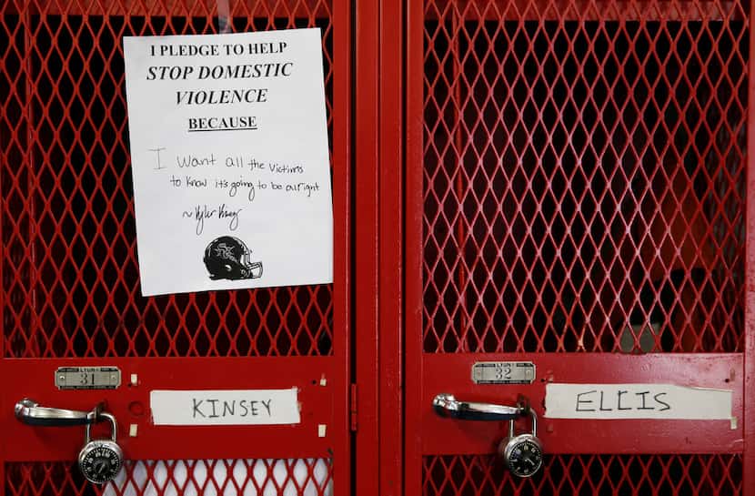 South Garland's Kyler Kinsey's pledge against domestic violence on his football locker at...