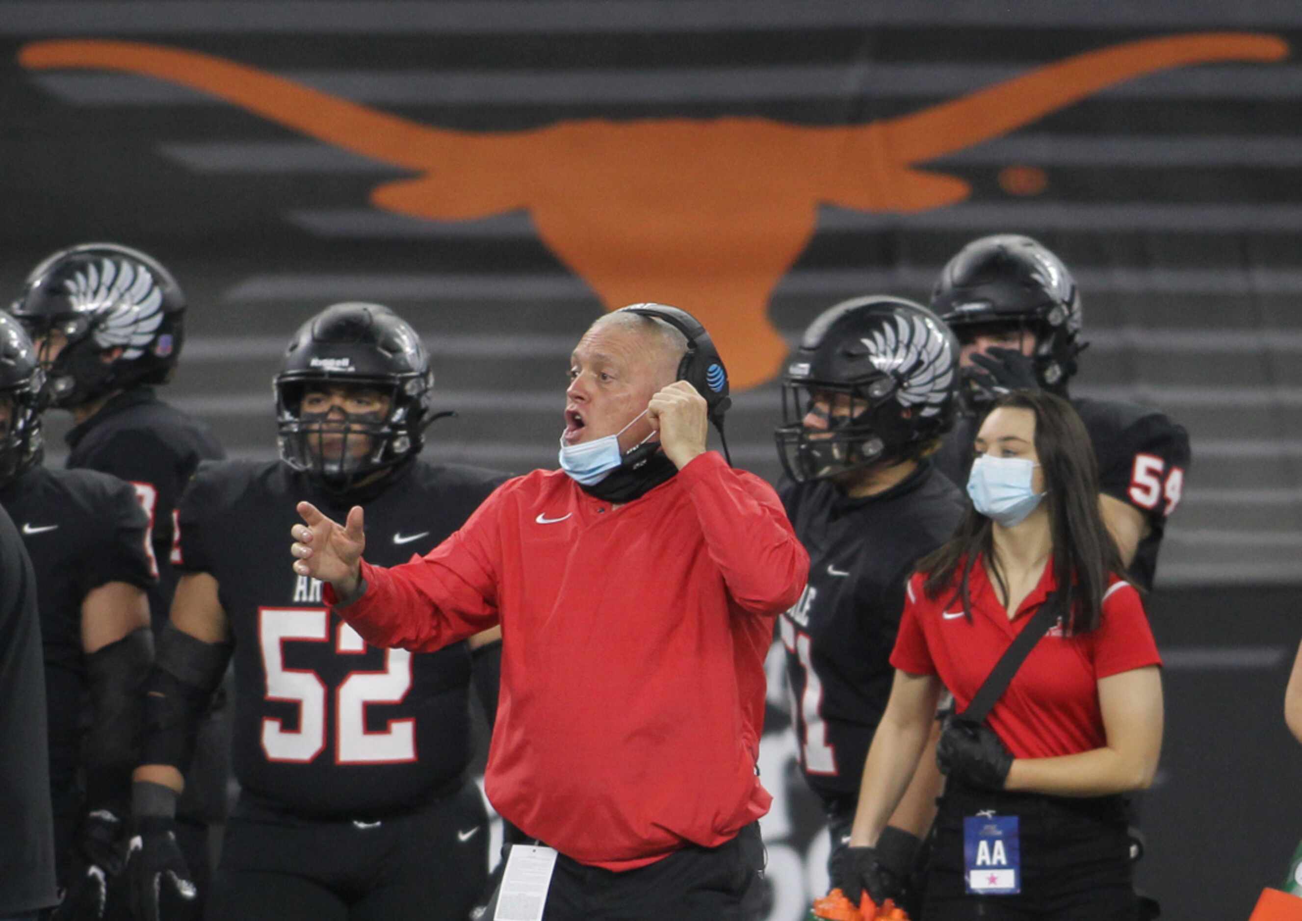 Argyle head coach Todd Rodgers emphatically delivers directions to the Argyle defense during...