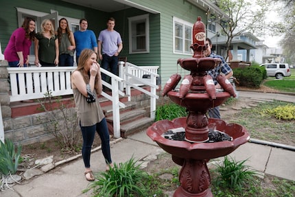 Claire Daniels, senior at Kansas State University, reacts after seeing her very own Dr...