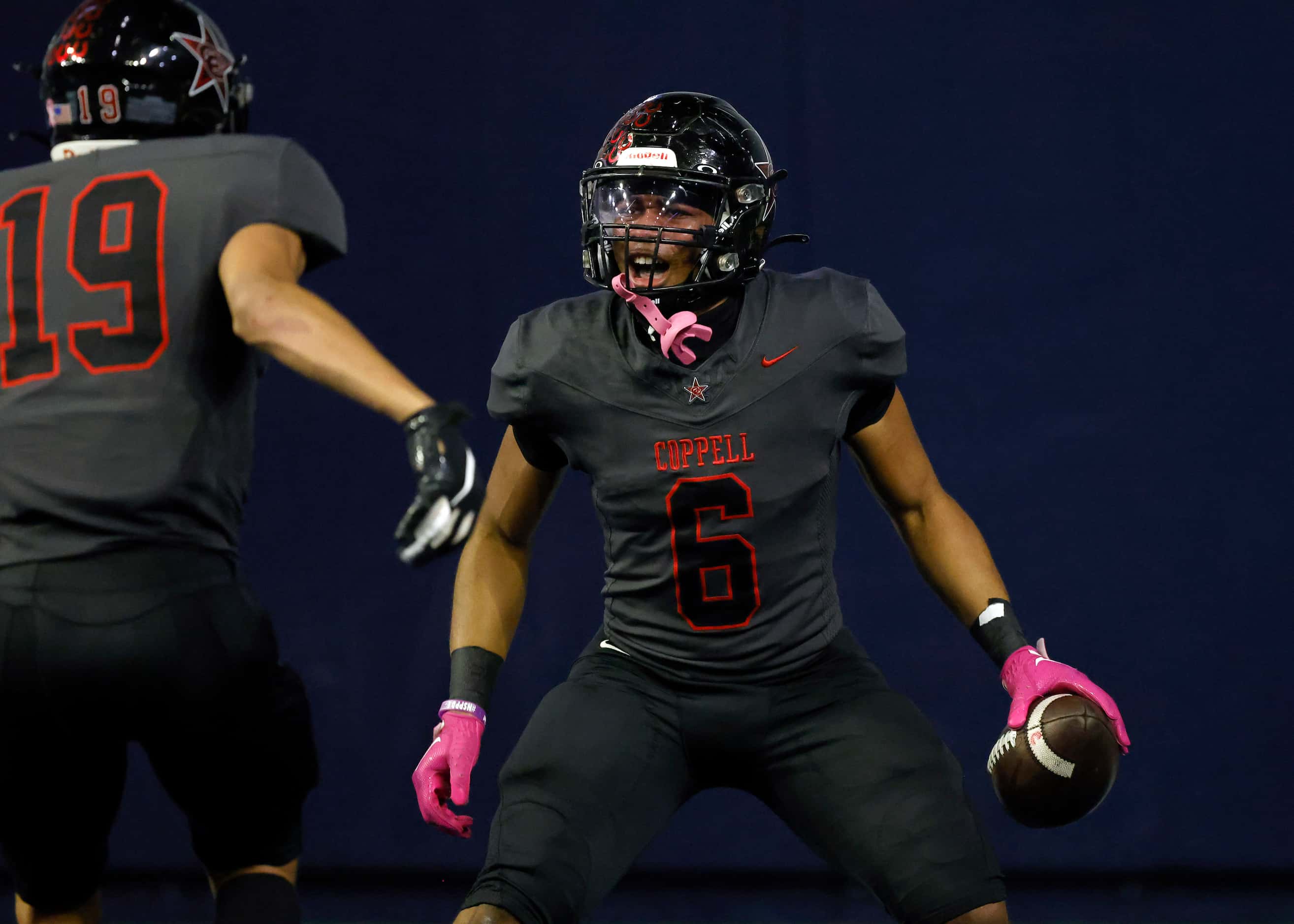 Coppell running back O’Marion Mbakwe (6) celebrates his fourth quarter touchdown run against...