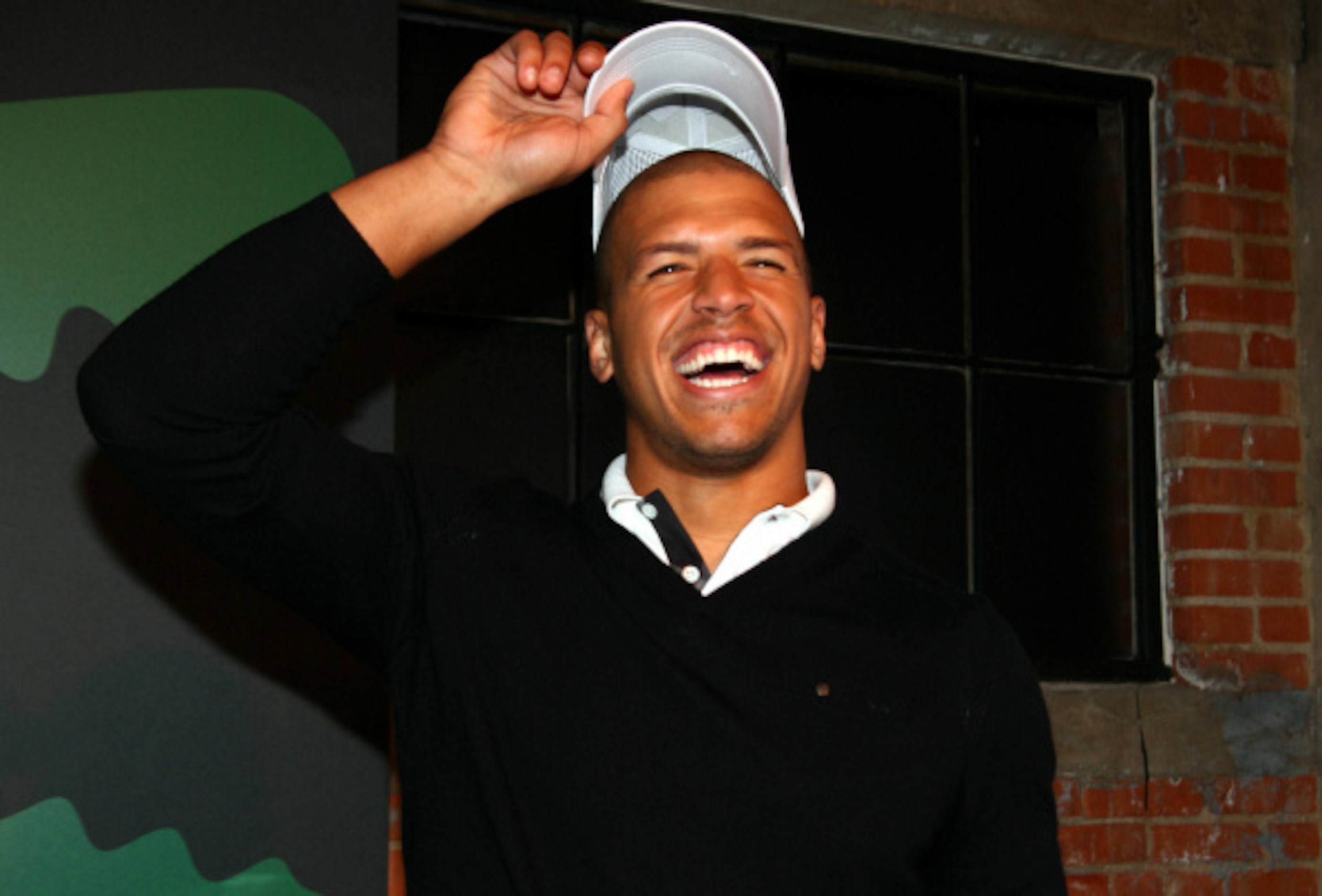 NFL player Miles Austin of the Dallas Cowboys attends GQ, Cadillac, Lacoste and Patron...