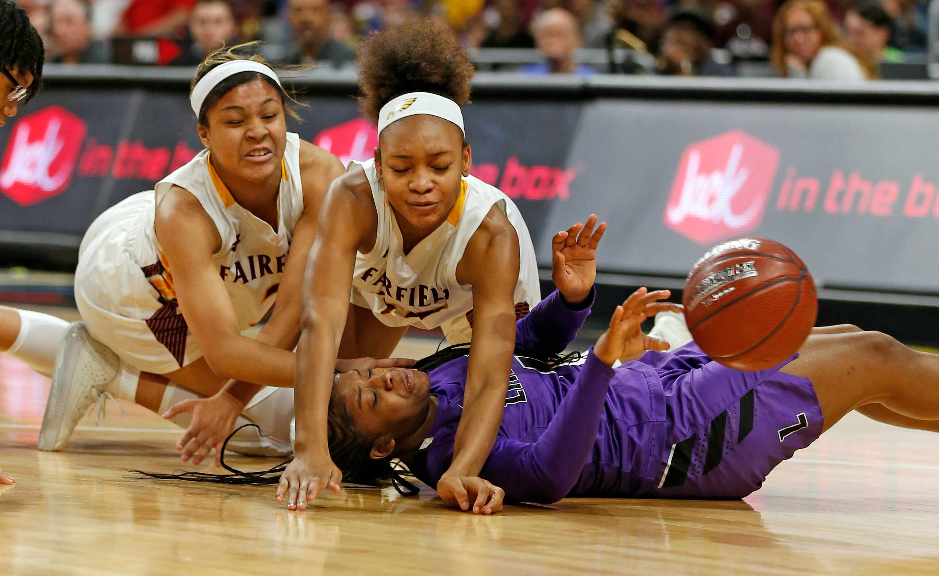 Lincoln guard Alexis Brown (#1) is pressured by Fairfield guard Shadasia Brackens (#20) for...