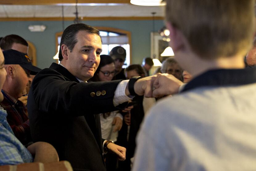 Sen. Ted Cruz fist bumps a supporter while stumping at Seneca Family Restaurant in Seneca,...