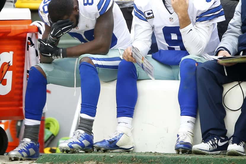 Dallas Cowboys wide receiver Dez Bryant (88) reflects on his missed 4th down catch as he...