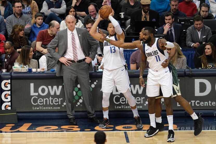 Dallas Mavericks head coach Rick Carlisle watches from the sidelines as guard Jalen Brunson...