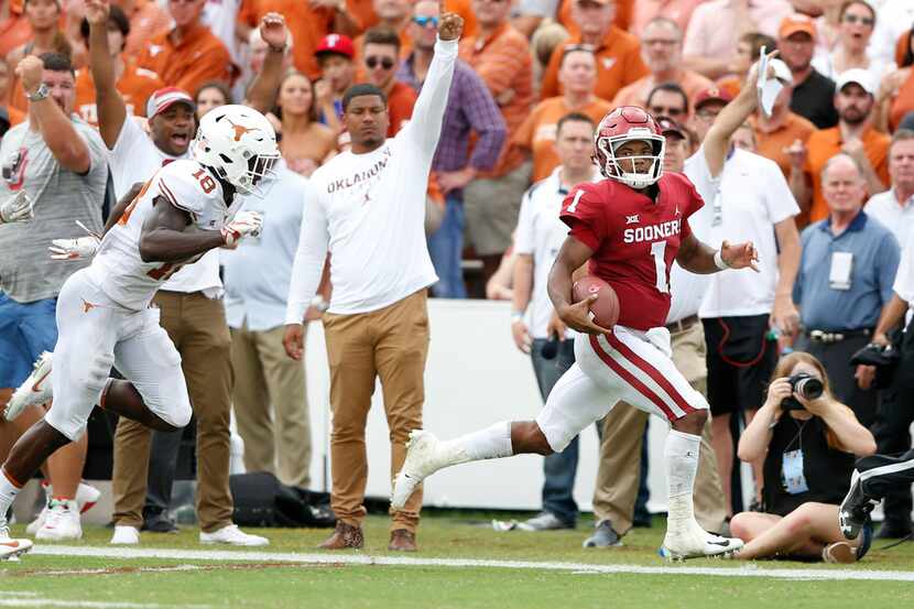 Oklahoma Sooners quarterback Kyler Murray (1) rushes up the field for a 67 yard touchdown as...