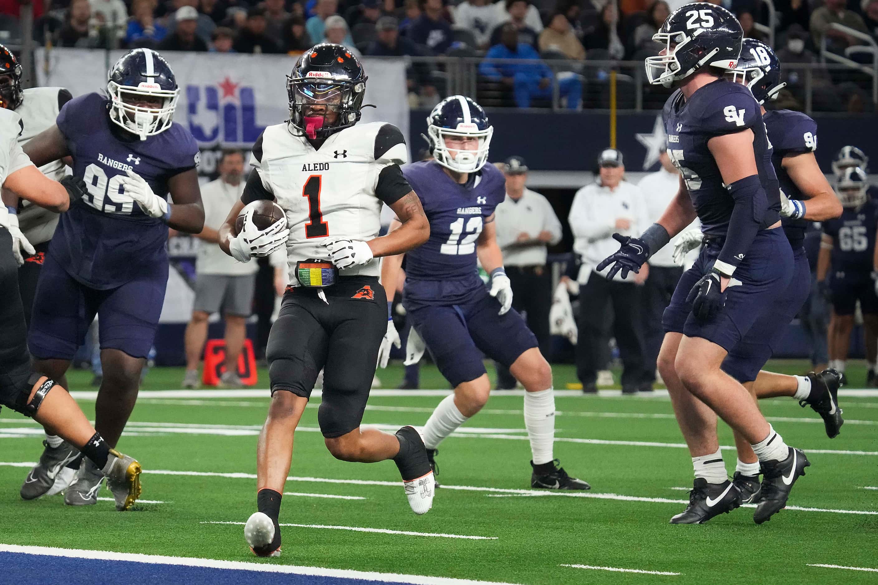 Aledo's Hawk Patrick-Daniels (1) scores on a 7-yard touchdown run during the first half of...