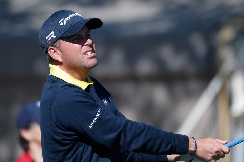 Matt Bettencourt, of Spartanburg, S.C., watches his tee shot on the 17th hole during the...