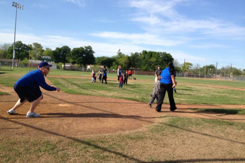 My first pitch at the Buddy League sails about two feet outside, but the memory will last...