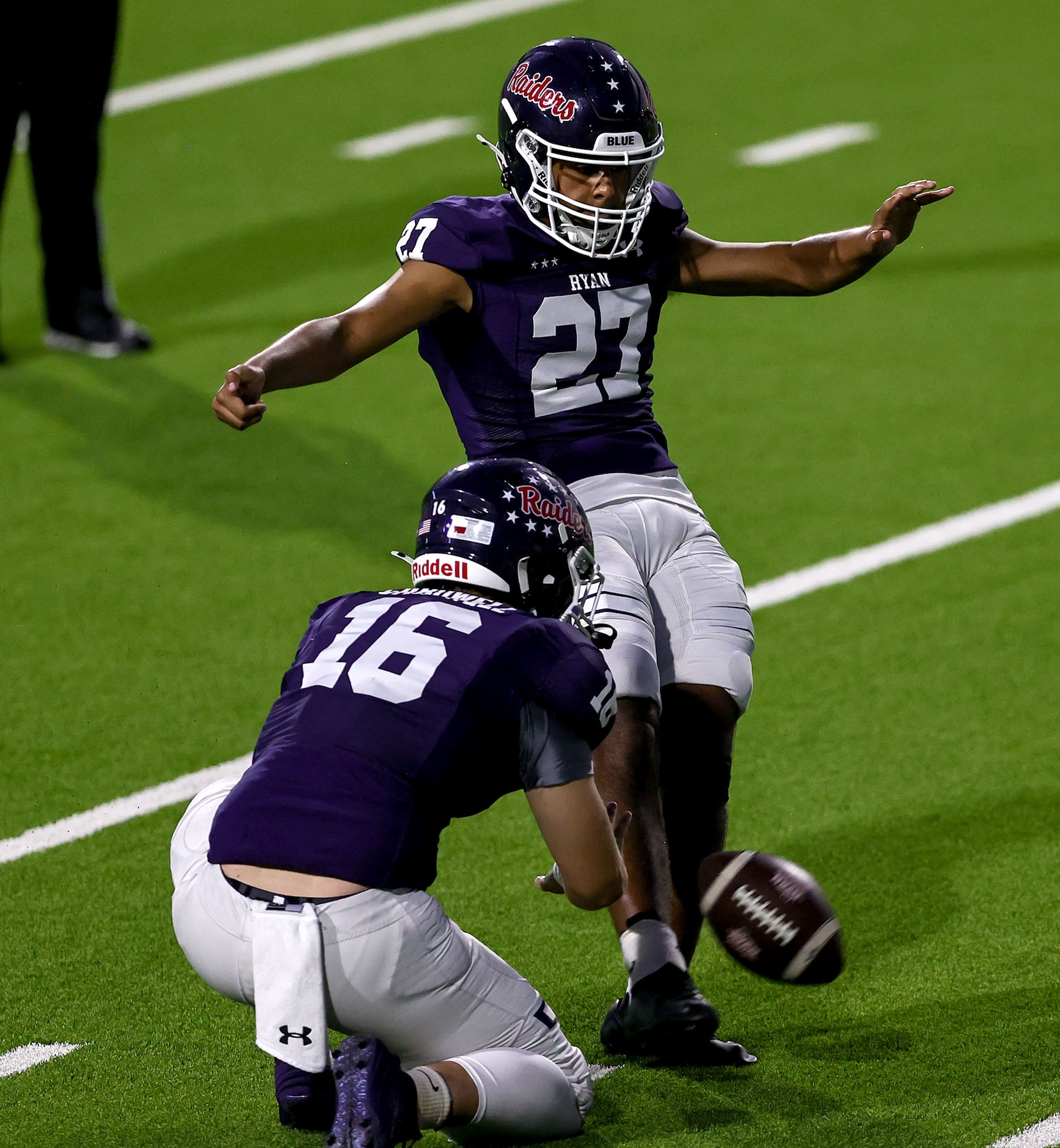 Denton Ryan kicker Daniel Rodriguez (27) attempts a field goal against Mansfield Timberview...