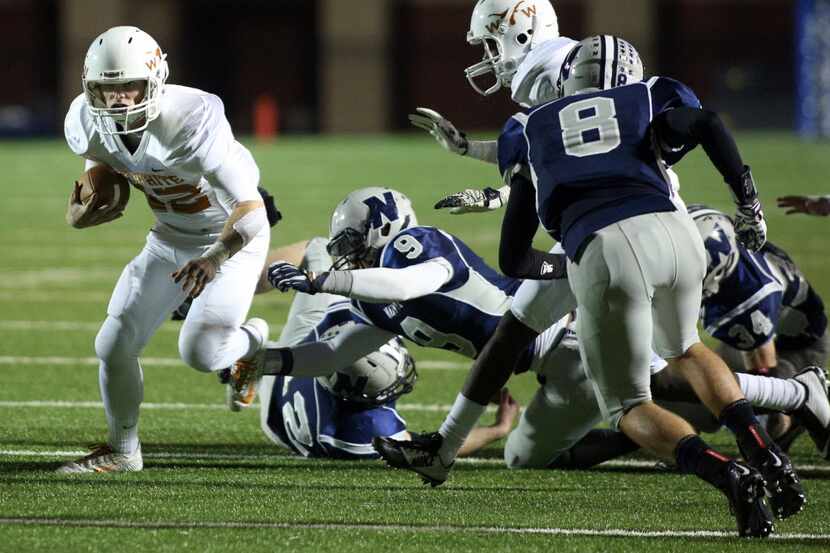 Nimitz's Noah Spears, cq, 9, dives at  W.T. White's Jackson Fults, cq, 12, in game action...