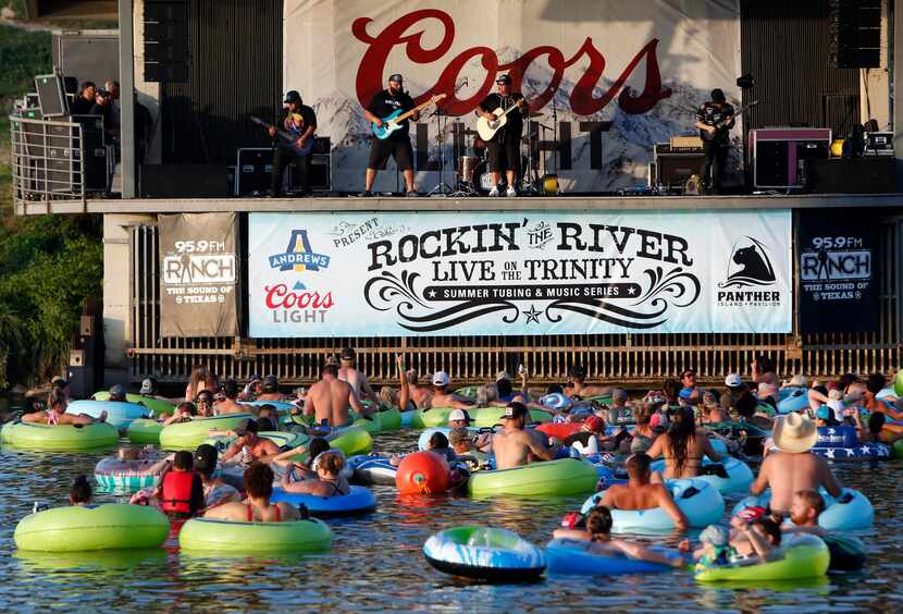 Giovannie and the Hired Guns performed for tubing enthusiasts below on July 10, 2021, as...