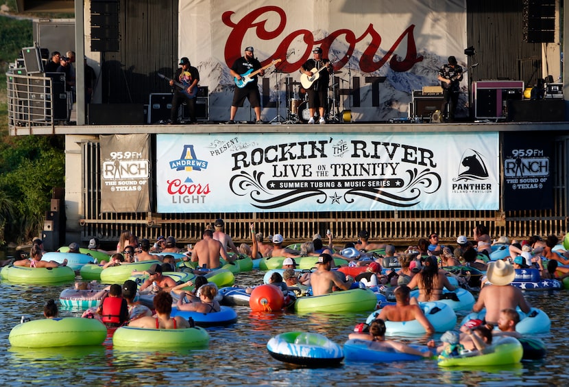 Giovannie and the Hired Guns performed for tubing enthusiasts below on July 10, 2021, as...