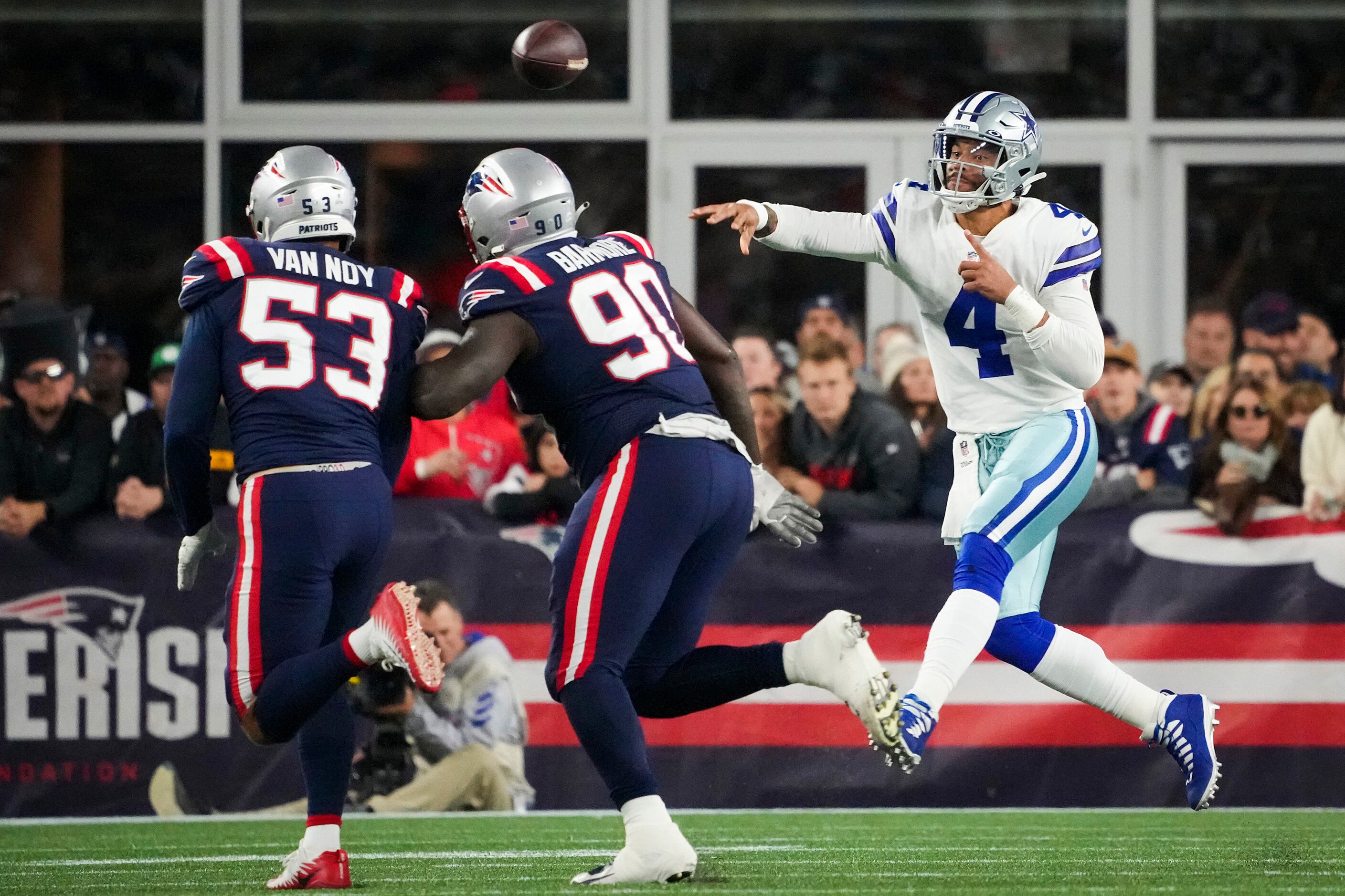 Dallas Cowboys quarterback Dak Prescott (4) throws a pass as New England Patriots defensive...