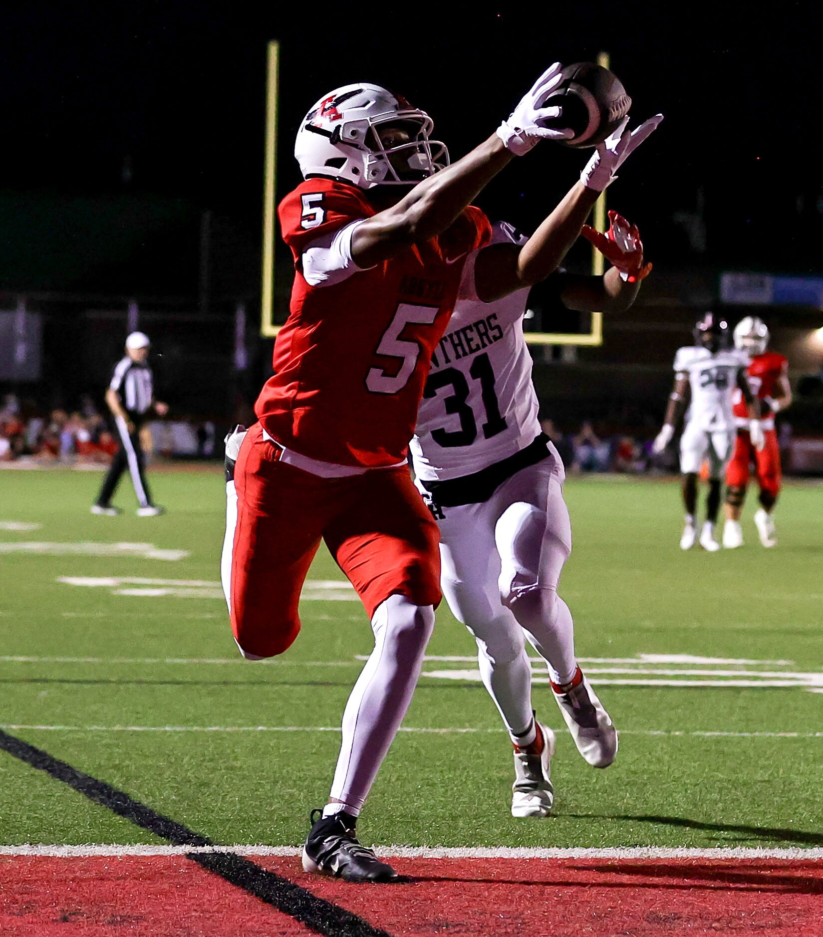 Argyle wide receiver Julian Caldwell (5) reaches out for a touchdown reception against...