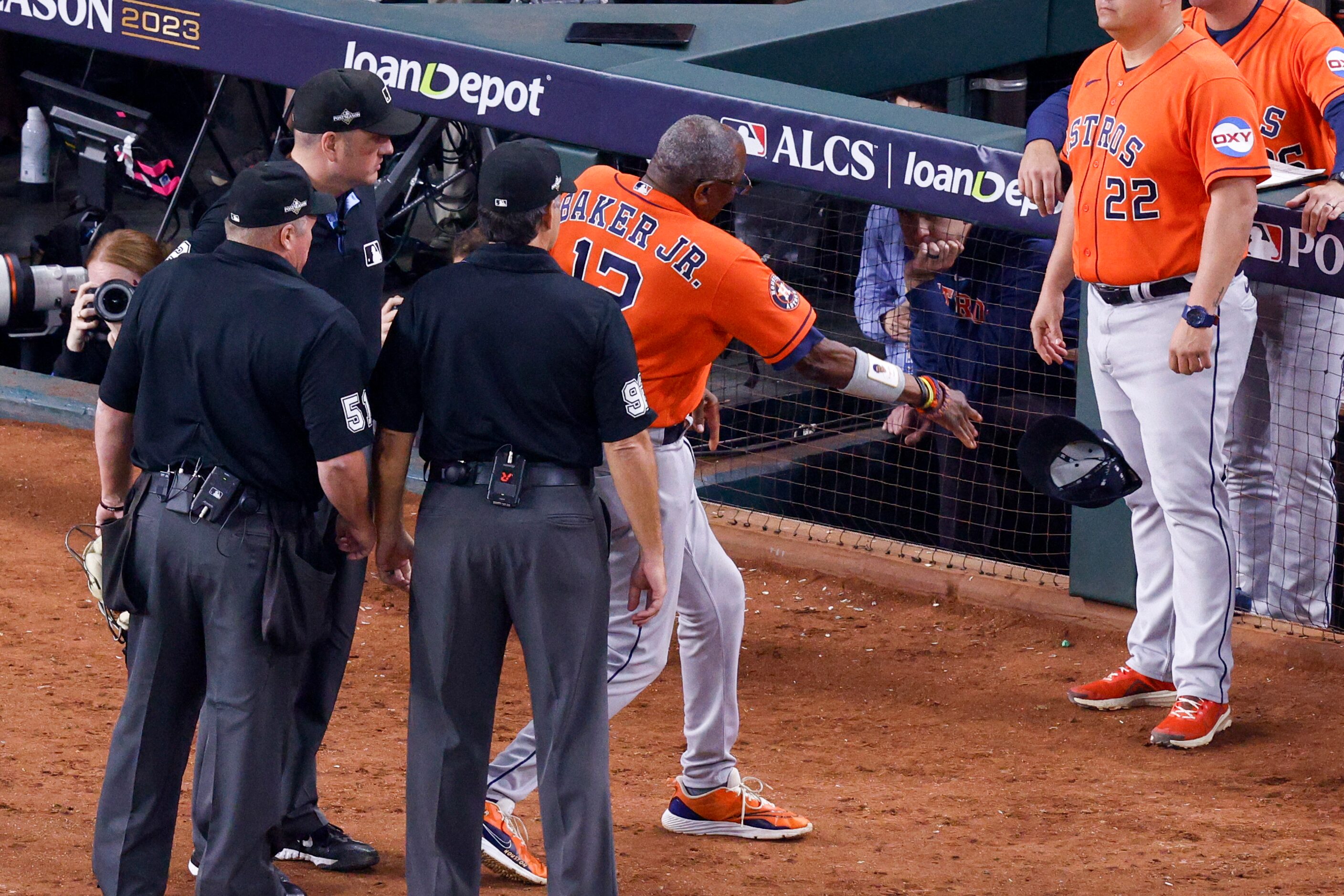 Houston Astros manager Dusty Baker Jr. (12) throws his hat while arguing with the umpires...