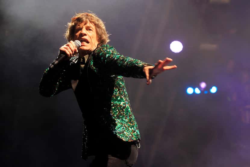 Mick Jagger performs in 2013. The Rolling Stones will appear at the Cotton Bowl on Nov. 2,...