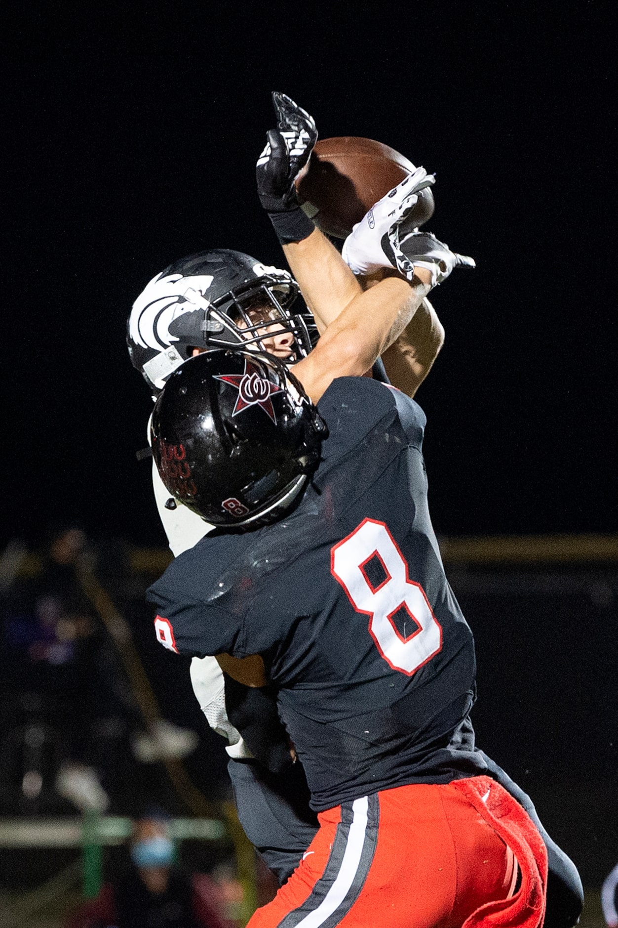 Coppell senior defensive back Canon Peters (8) breaks up a pass intended for Plano West...