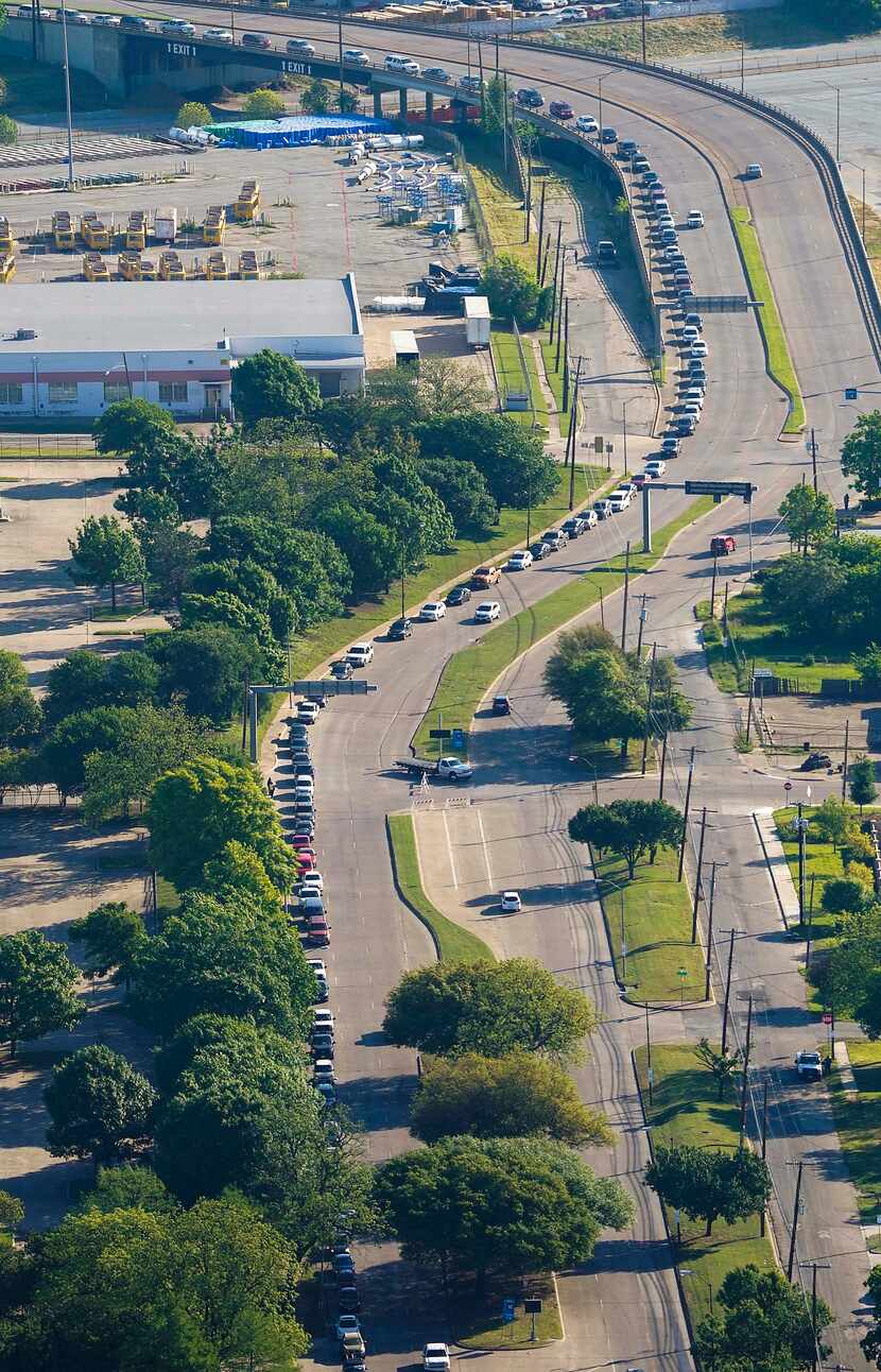 Traffic stretched nearly 2 miles at a food distribution at Fair Park last month.