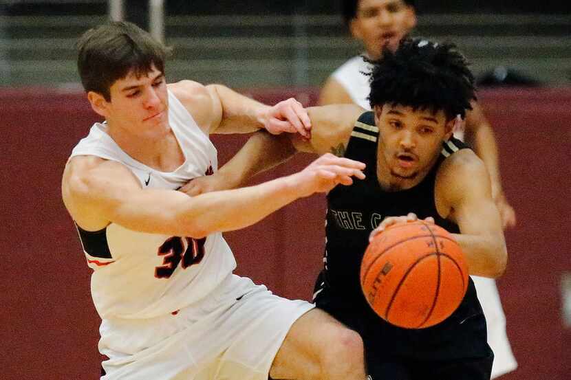 Colleyvile Heritage's Brayden Gerlich has the ball stolen by The Colony's Garren Davis...