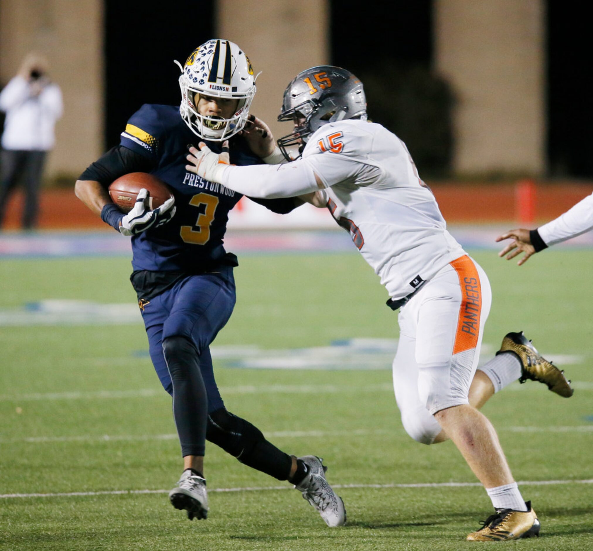 Prestwood Christian Academy Richard Baker (3) is tackled by St Pius X High School Ben Pierce...