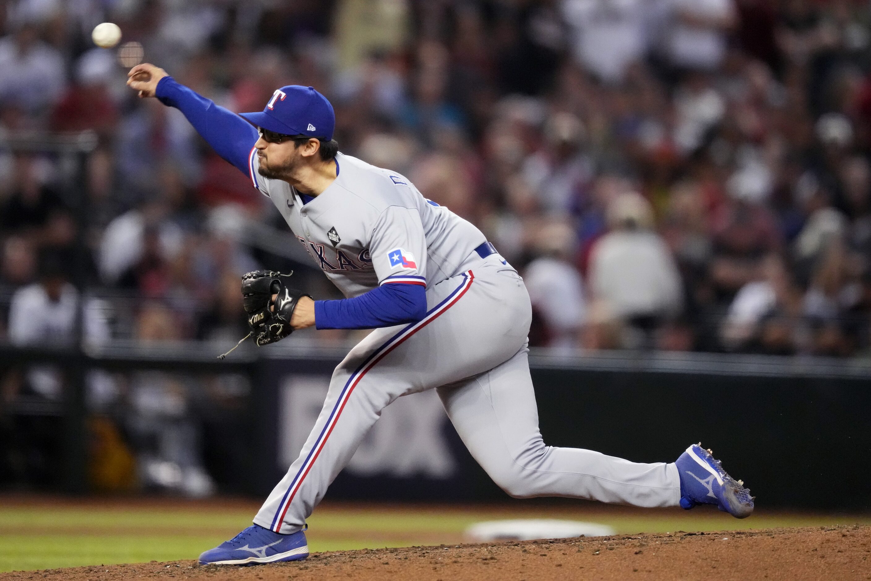 Texas Rangers relief pitcher Dane Dunning  throws during the sixth inning in Game 4 of the...