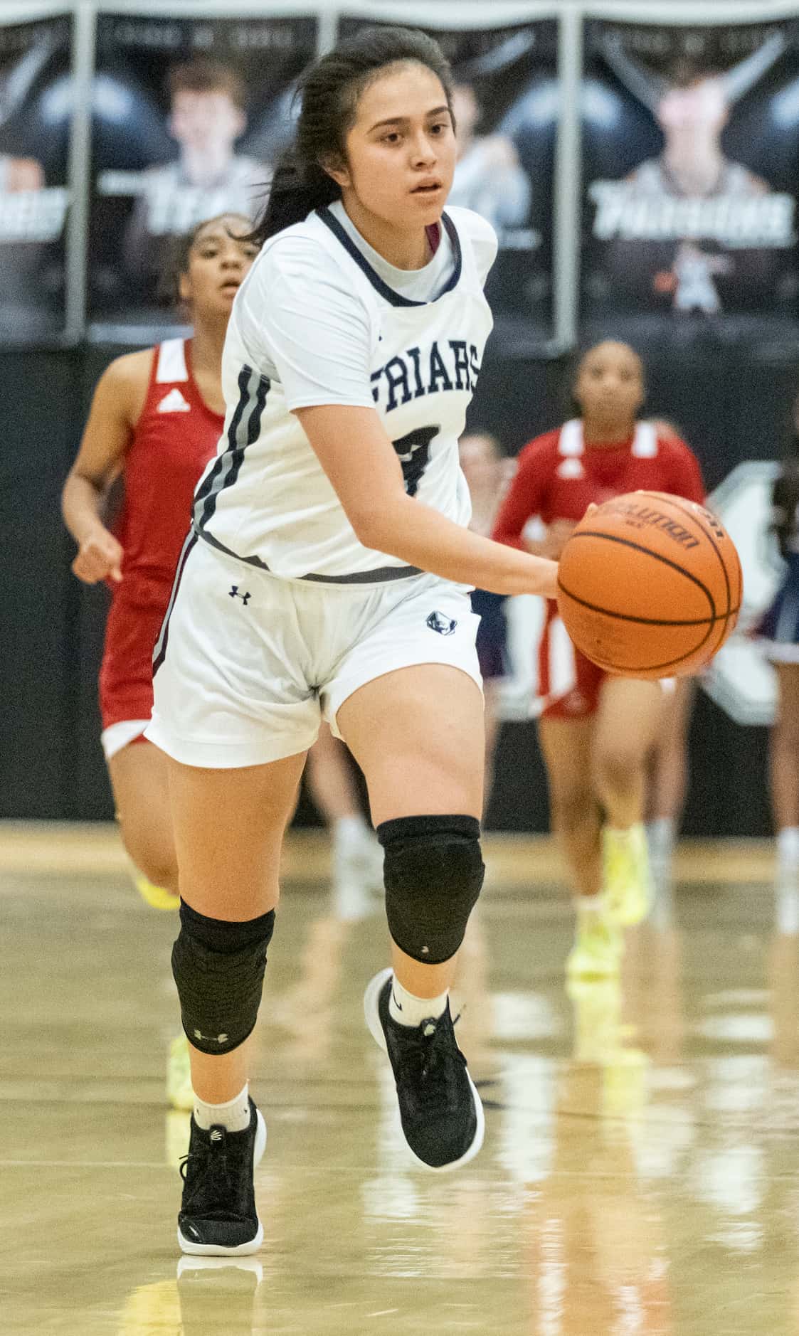 Bishop Lynch High School Natalie Cardenas (3) dribbles the ball up the court during the game...