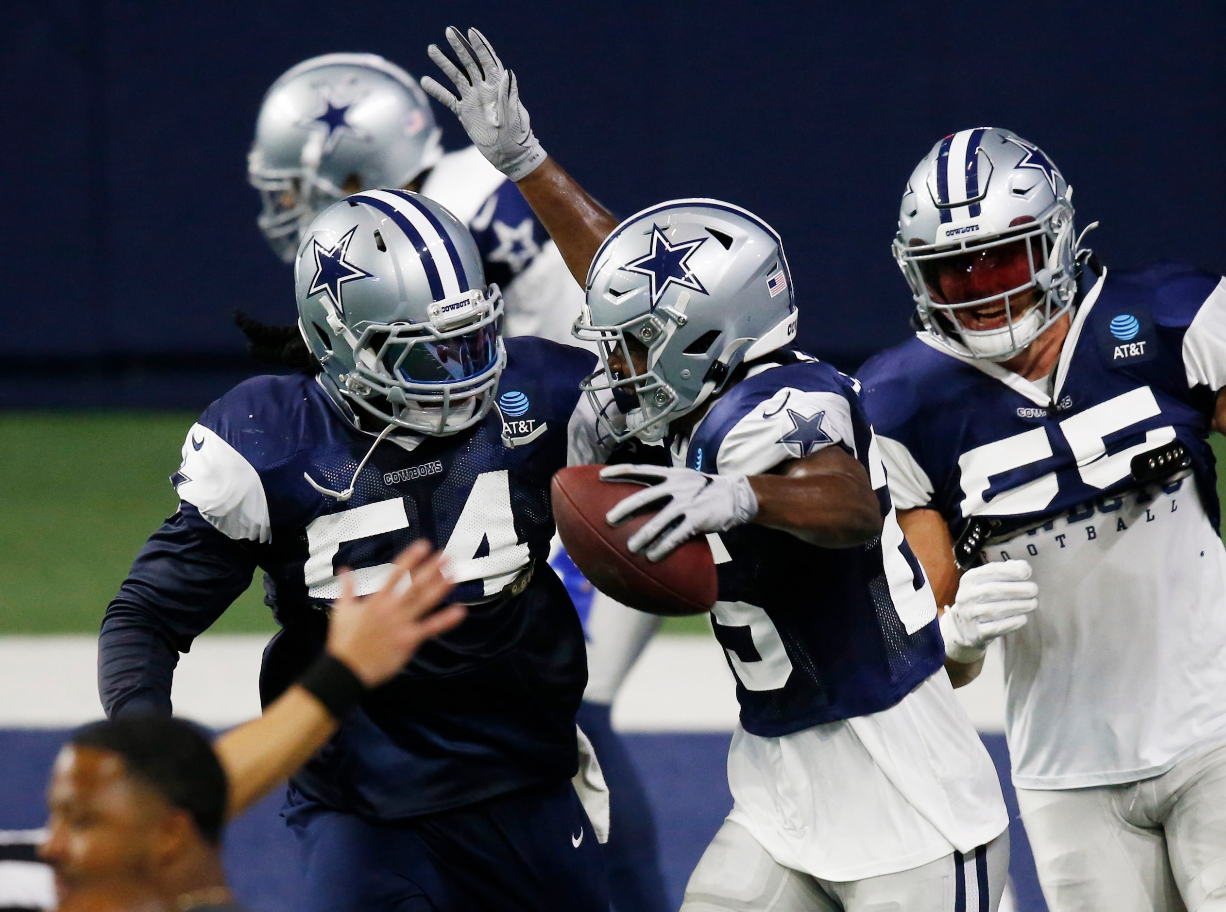 Dallas Cowboys safety Xavier Woods (25) celebrates with Dallas Cowboys linebacker Jaylon...