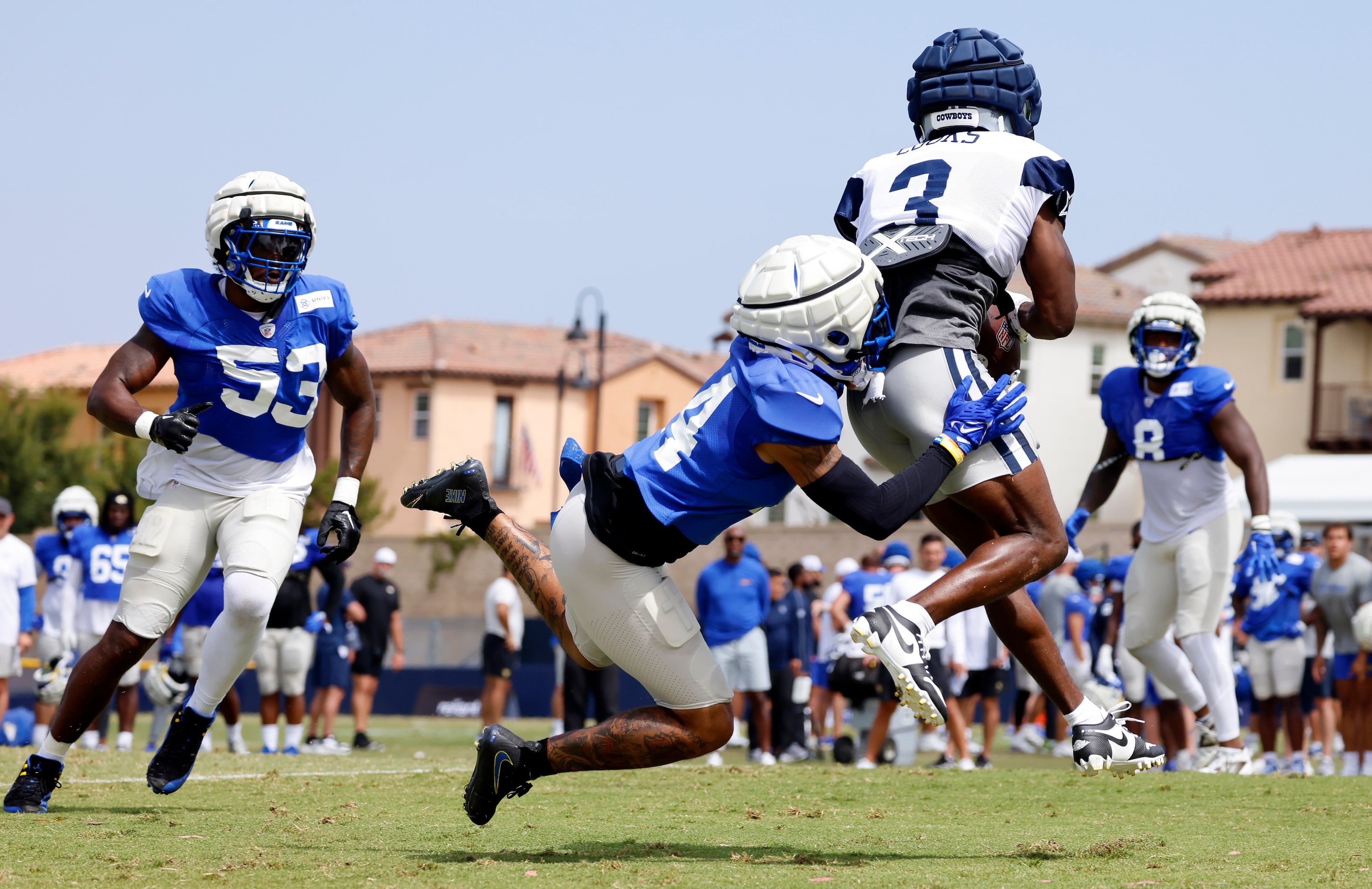 Dallas Cowboys wide receiver Brandin Cooks (3) catches a touchdown as he’s tackled by Los...