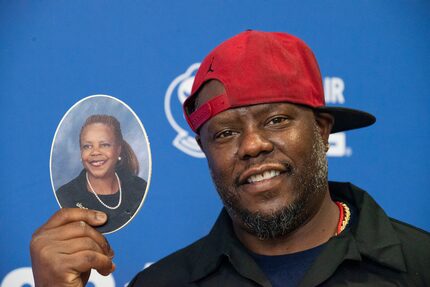 Chef Greg Parish holds a photo of his mother Norma Parish after winning 'most creative' and...