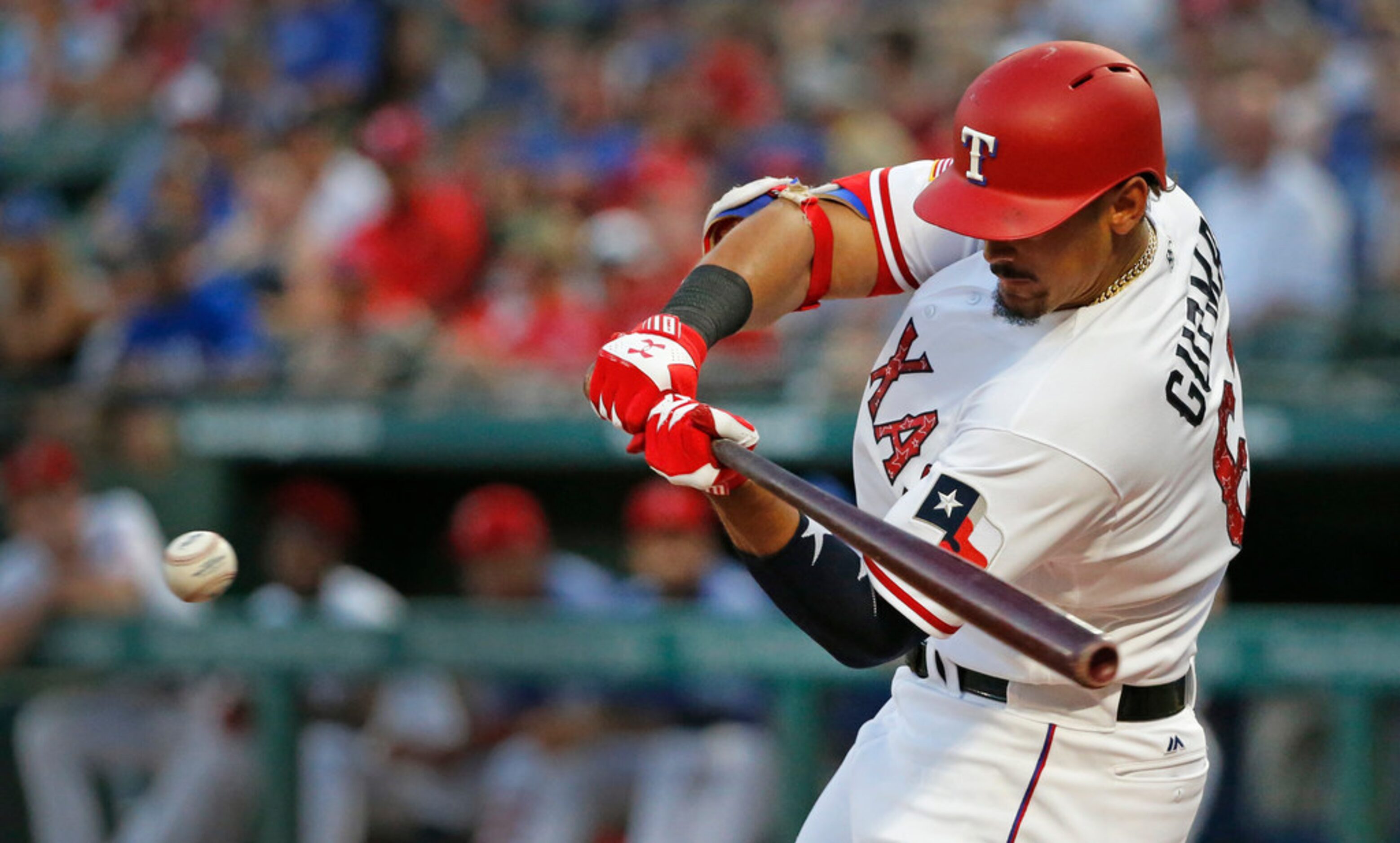 Texas Rangers first baseman Ronald Guzman (67) gets the first hit off of Houston Astros...