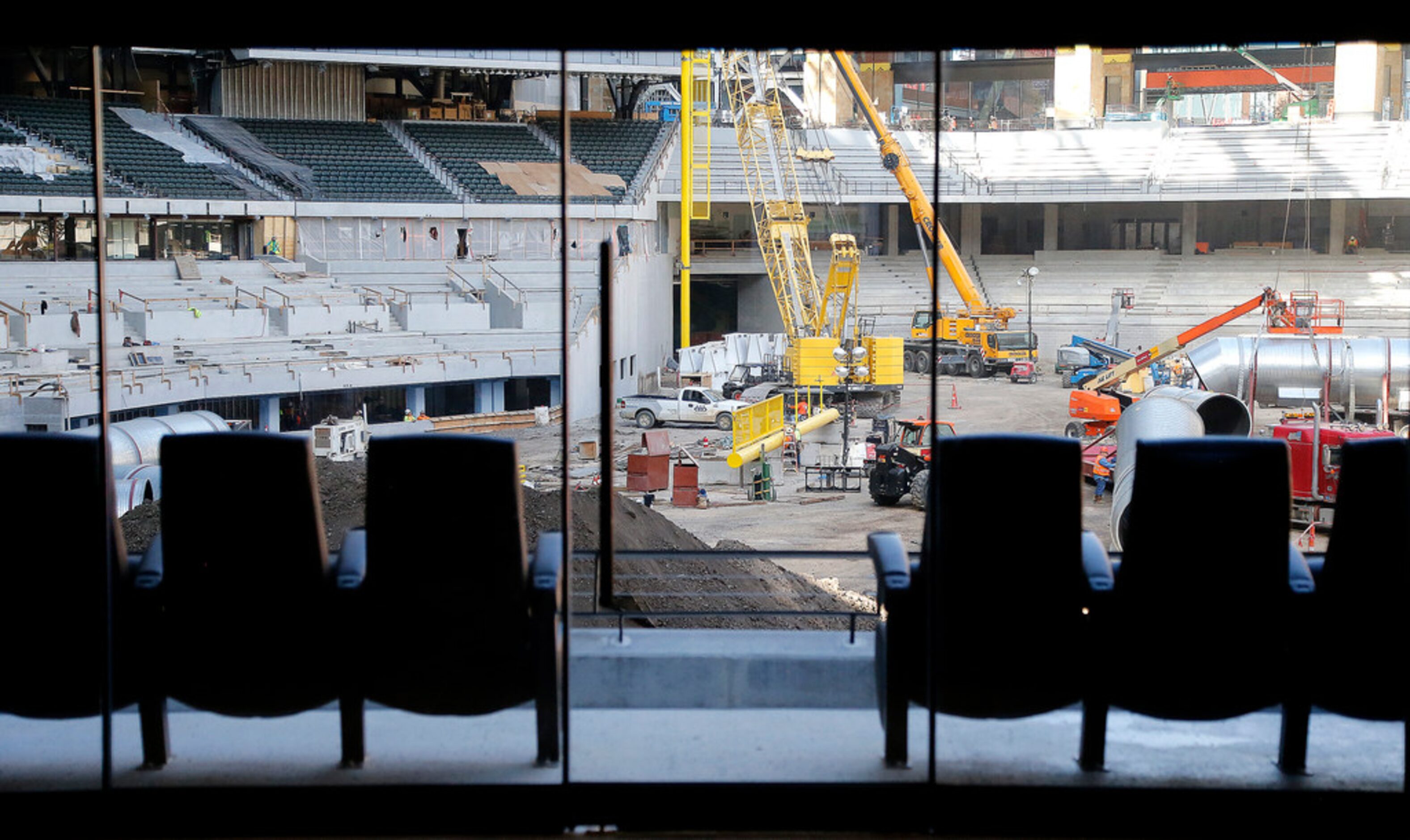 Construction under way, as seen through a suite at Globe Life Field in Arlington on Tuesday,...