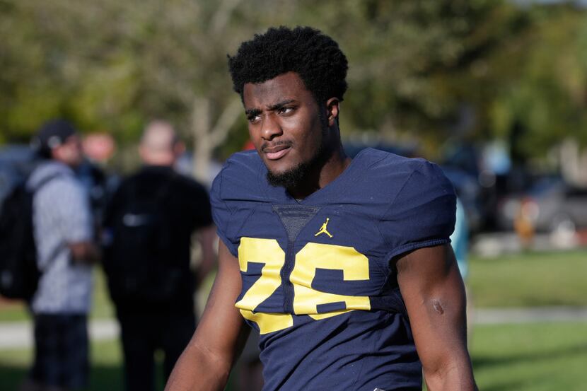 Michigan cornerback Jourdan Lewis (26) arrives for NCAA college football practice, Tuesday,...