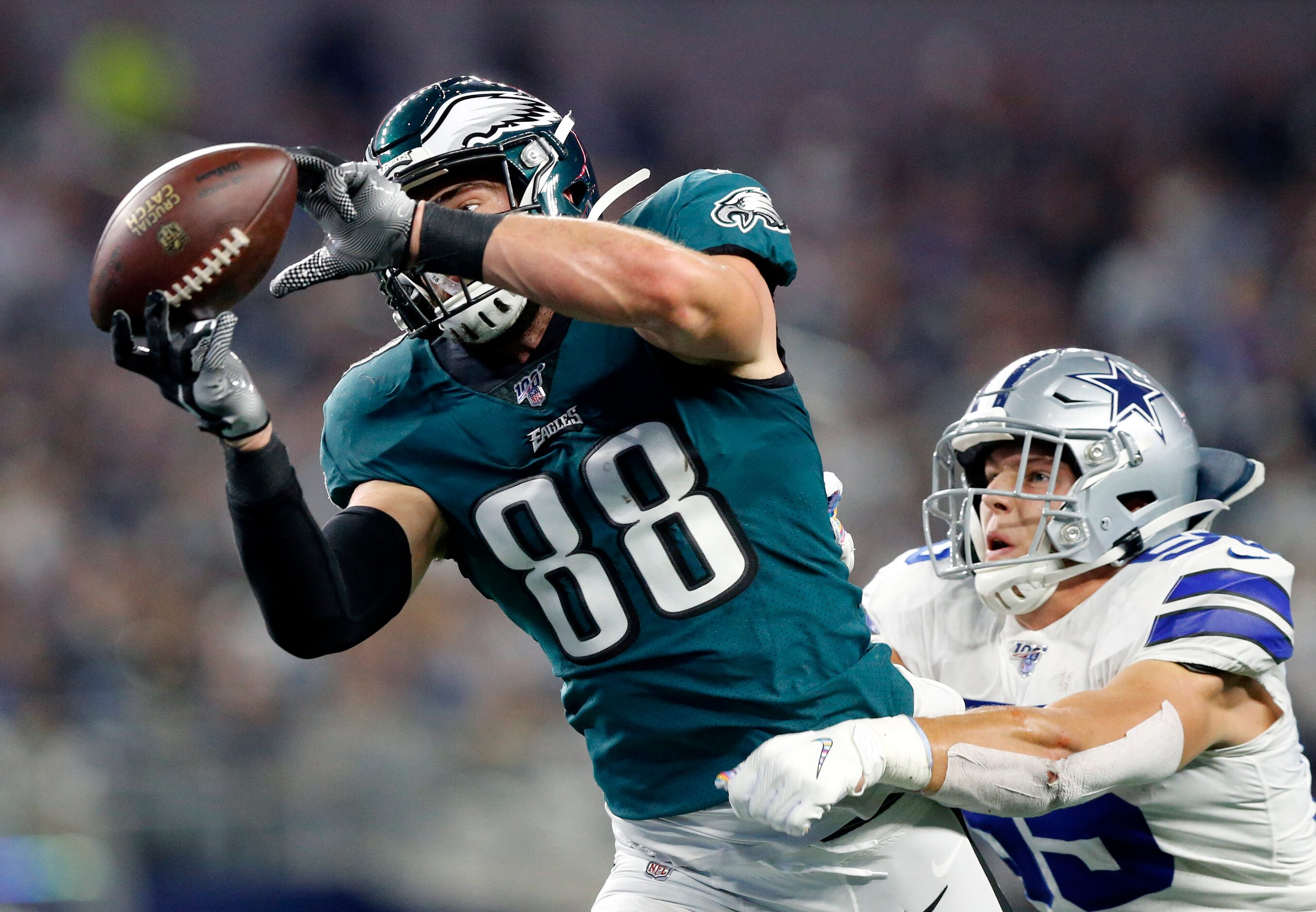 Philadelphia Eagles tight end Dallas Goedert (88) makes a fingertip catch to score a first...