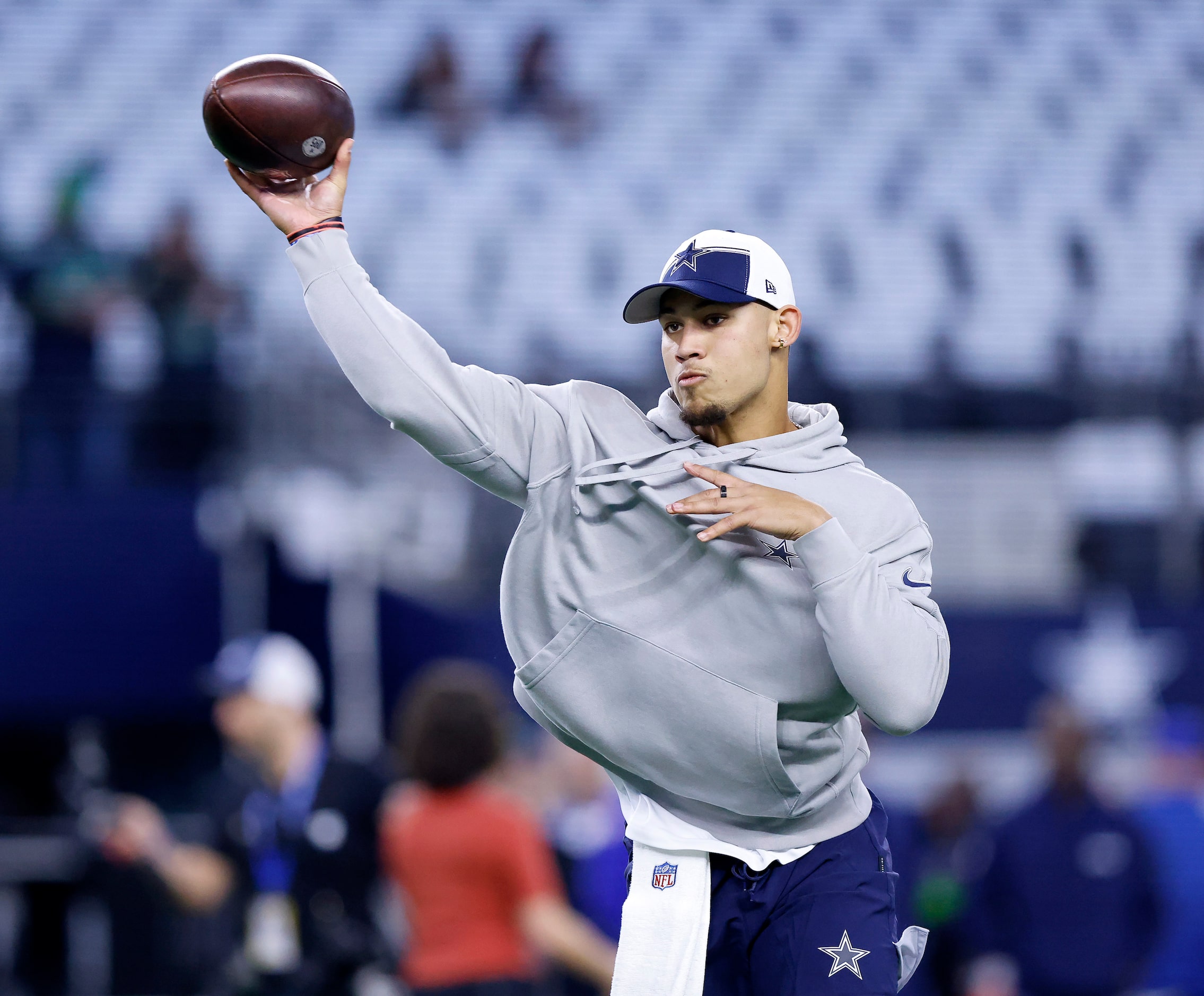 Dallas Cowboys quarterback Trey Lance throws during pregame warmups before the team faces...