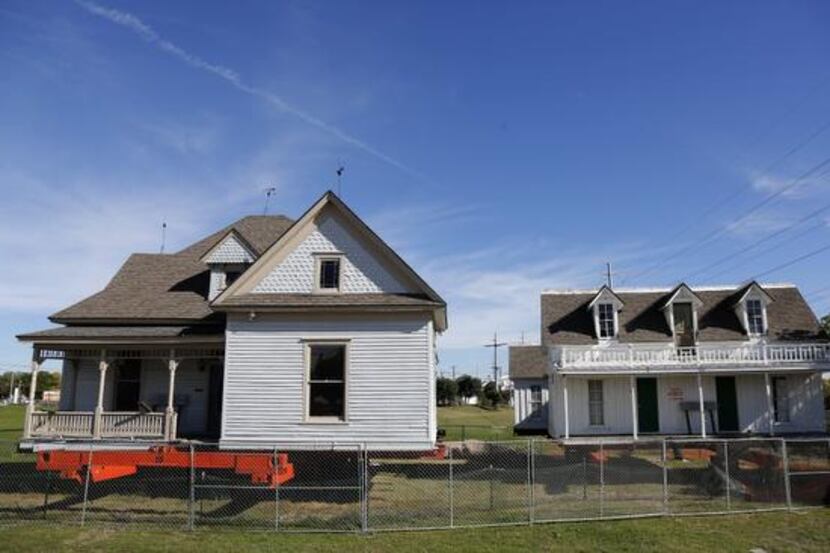 
The Pace and Lyles houses in downtown Garland wait on supports for a decision of where they...